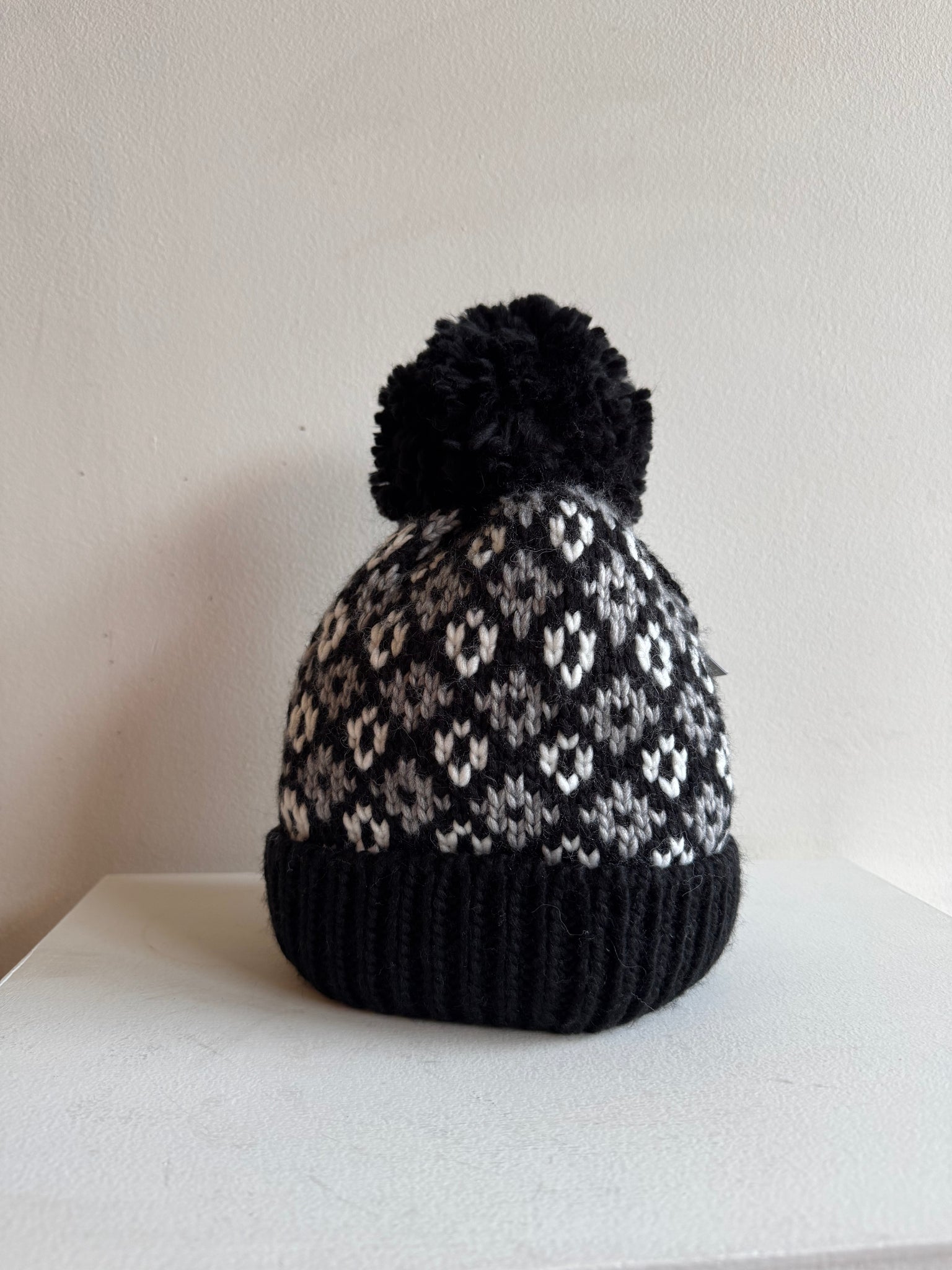 Bula - Cable Pom Hat in Black Pattern